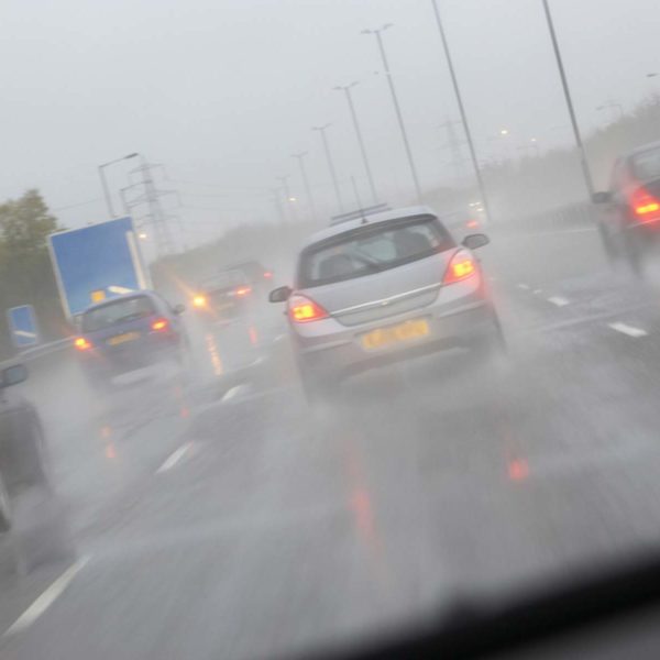 Cars Driving In Wet Weather