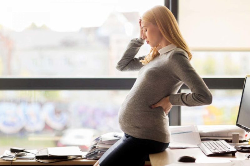 Pregnant Woman At Work