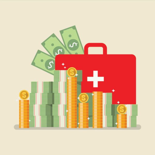 Image Of Money And First Aid Kit